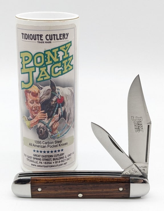 GEC Tidioute Cutlery Cocobolo Wood Pony Jack Knife: Tidioute Cutlery Cocobolo Wood Pony Jack Knife 681221 w/ Tube. Knife is in very nice condition with some tarnishing on the bolsters. Overall measures 3-1/2in when closed. Ref #: 273