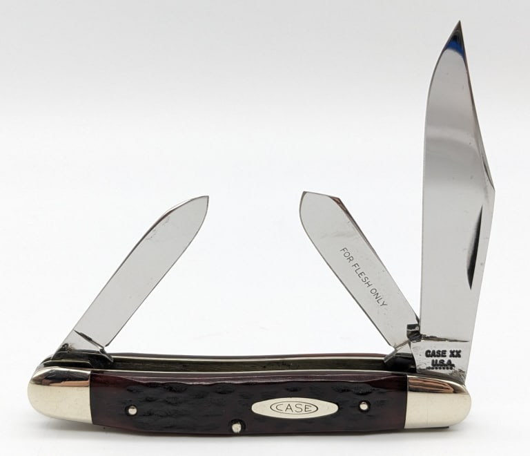 1973 Case XX Jigged Bone Stockman Knife 6347PE: 1973 Case XX Jigged Bone Stockman 6347PE. Knife is in very nice condition with some carbon spots on the blades, and scuffs on the bolsters from handling. Overall measures 4in when closed. Ref #: 361