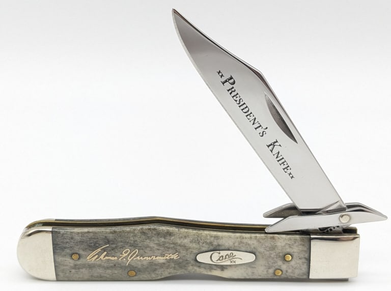 2002 Case XX Grey Bone President's Cheetah Knife: 2002 Case XX Smooth Grey Bone President's Cheetah Knife 6111 1/2. Knife features President's Knife etchings on the blade, and Thomas E. Arrowsmith engraved on the handle. Knife is in very nice conditi