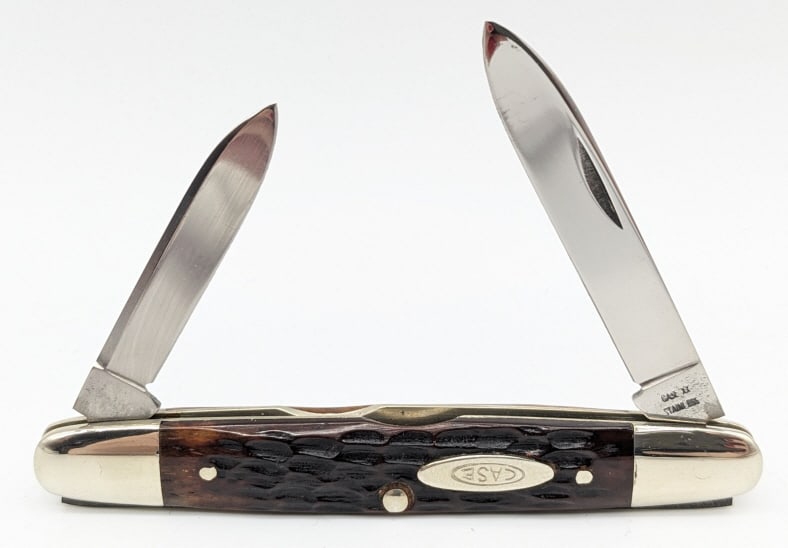 1965-69 Case XX Jigged Bone Eisenhower 06263: 1965-69 Case XX Jigged Bone Eisenhower 06263. Knife is very nice condition with light wear from handling and age, and the Case medallion is on upside down. Overall measures 3-1/8in when closed. Ref #: