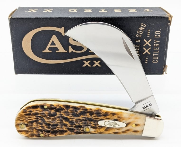 2022 Case XX Amber Bone Barehead Hawkbill Knife: 2022 Case XX Amber Bone Bareheaded Hawkbill 61011 w/ Box. Knife is in very nice condition with light wear from handling. Overall measures 4in when closed. Ref #: 2353