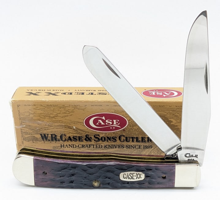 1996 Case XX Purple Bone Trapper Knife 6254 w/ Box: 1996 Case XX Purple Bone Trapper 6254 w/ Box. Knife is in very nice condition with light wear from handling. Overall measures 4-1/8in when closed. Ref #: 2369