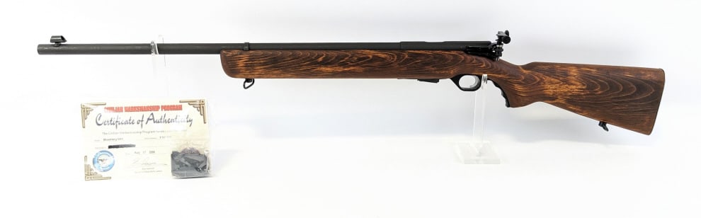 US Property Mossberg M44 .22 LR Training Rifle: US Property Mossberg M44 .22 LR Training Rifle. Comes with the Civilian Marksmanship Program COA, manual, and two extra mags. Features a 26in barrel, Mossberg Microclick S-100 aperature sight, parkeri