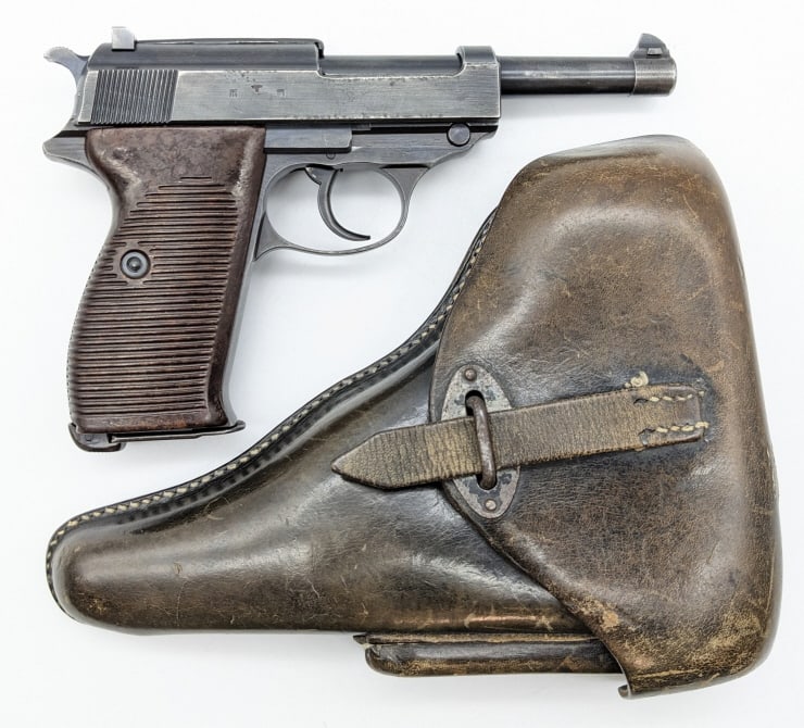 WWII German Walther P-38 9x19 Pistol w/ Holster: WWII German Walther P-38 9x19 Semi Auto Pistol w/ Holster. Features a 5in barrel, German acceptance marks, blued finish, and bakelite grips. The leather holster is marked with German acceptance marks,