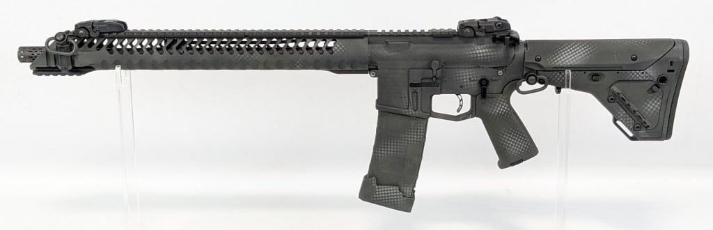 Shepherd Firearms 5.56 Semi Auto Elite M4 Carbine: Shepherd Firearms 5.56 Semi Auto Elite M4 Carbine. Rifle features a 16in barrel with a flash hider, skeletonized and dimpled foregrip, scalloped upper receiver, picatinny top rail mount and tri rail m