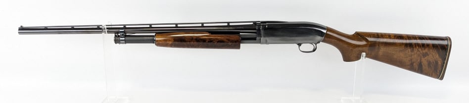 Browning Model 12 28 Ga Pump Action Shotgun: Browning Model 12 28 Ga Pump Action Shotgun. Features a vented rib, blued finish, and high grade curly hardwood stock. Shotgun is in very nice condition with light wear from use and handling. FFL Requ