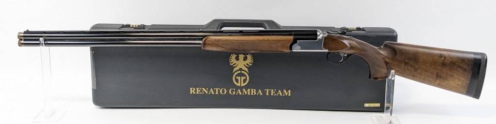 Renato Gamba Concorde 12 Ga O/U Shotgun w/ Case: Renato Gamba Concorde 12 Ga O/U Shotgun w/ Case. Shotgun features 32in barrels with two screw in extended chokes, tapering flat rib, semi polished nickel finish reveiver with engraving, and fine check