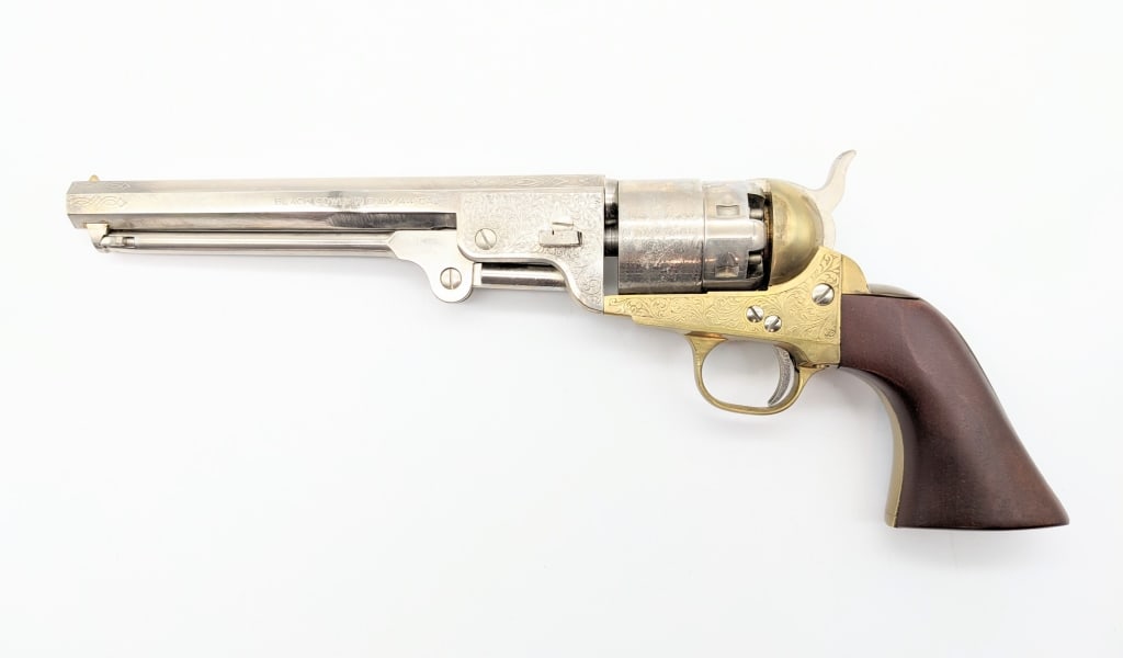 Pietta 1851 Navy .44 Cal Blackpowder Revolver: Engraved Pietta 1851 Navy .44 Cal Blackpowder Revolver. Features a 7-1/2in barrel, chrome finish, engraved barrel and receiver, battleship engraved cylinder, brass trigger guard and grip frame, and sm