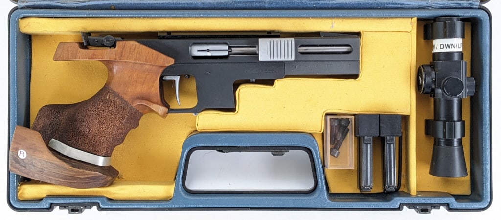 Pardini Fiocchi MP .32 WC Semi Auto Target Pistol: Pardini Fiocchi Model MP .32 WC Semi Auto Target Pistol. Pistol comes with the original carry case, two magazines, and an Oakshore Elctronic Dot Sight. Pistol features a 4-3/4in barrel, top scope rail