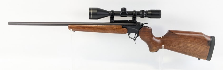 Thompson Center Arms Encore .222 Rem SS Rifle: Thompson Center Arms Encore .222 Rem Single Shot Rifle. Features a 24in Bergara barrel, Tasco 3-9x50 scope, matte black finish, and smooth wood stock. Rifle is in very nice condition with minimal wear