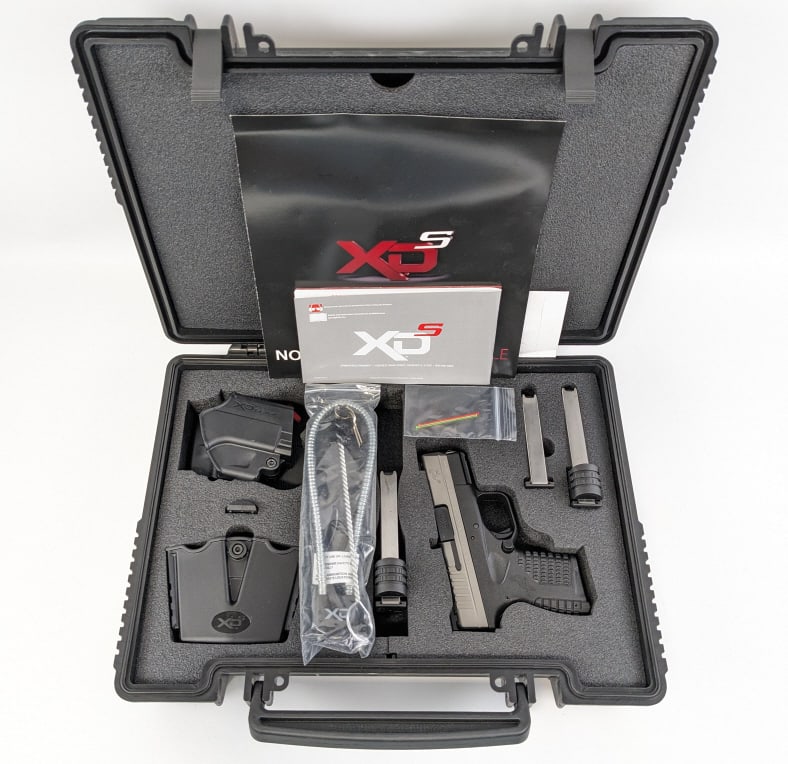Springfield Armory XDS-45 Compact .45 ACP Pistol: Springfield Armory XDS-45 Compact .45 ACP Pistol w/ Case. Comes in the case with two extra magazines, OWB holster, and mag carrier. Features a 3-1/4in barrel, fiber optic front sight, under barrel rai
