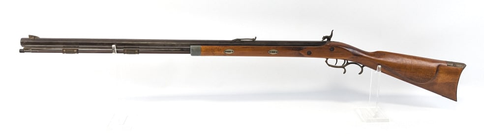 Connecticut Valley Arms .50 Cal Muzzleloader Rifle: Connecticut Valley Arms .50 Cal Muzzleloader Rifle. Features a 32in octogon barrel, brown finish, color case hardened locking plate, and smooth wood stock with a cap trap door. Rifle is in fair aged c
