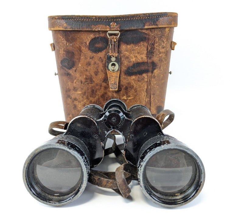 Carl Zeiss Jena Binoctem 7x50 Binoculars w/ Case: WWII German Army Officers Lion's Head Saber w/ Scabbard. Saber is made by Robert Klaas Kissing Crane and monogramed to HR 1939. Features a mirror polished fullered blade, brass P guard with German pol