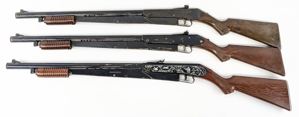 (3) Daisy Model No. 25 Lever Action BB Air Rifles: (3) Daisy Model No. 25 Lever Action BB Air Rifles. Rifles are in good aged condition with with blued finishes, etched and stamped designs on the receiver, and wood grain finish plastic stocks. Overall