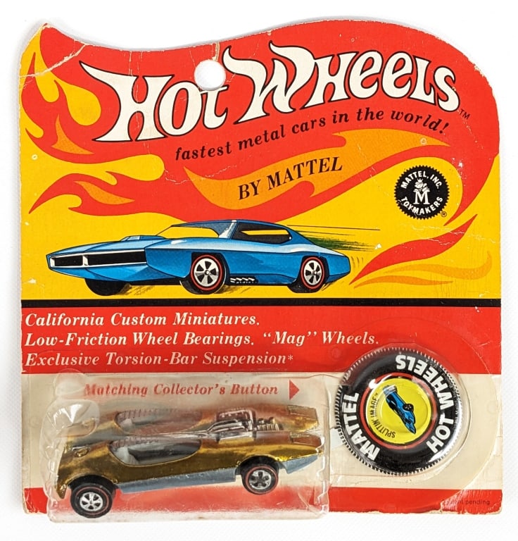Hot Wheels Redline Splittin Image In Blister Pack: Hot Wheels Redline Splittin Image on blister card. The card has creasing and soft corners. The blister is staring to peel on the right side. The car has some discoloration around the engine bay and ex