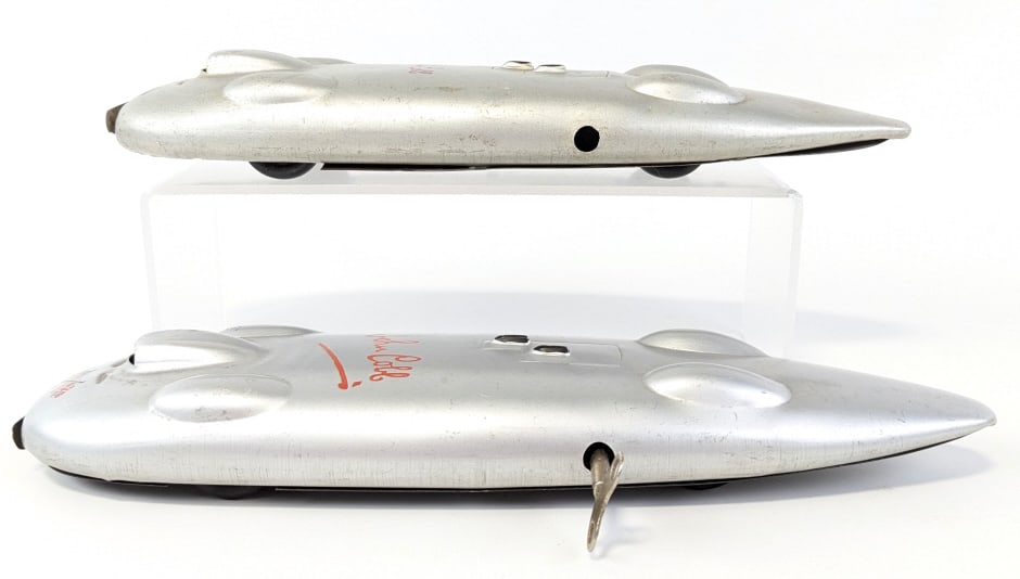 2 Minimodels Tin Windup John Cobb Land Speed Racer: (2) Minimodels tin windup John Cobb land speed racer. The cars have some scratches and wear from age. The one windup mechanism works the other is missing the mechanism. Each measures approximately 10-