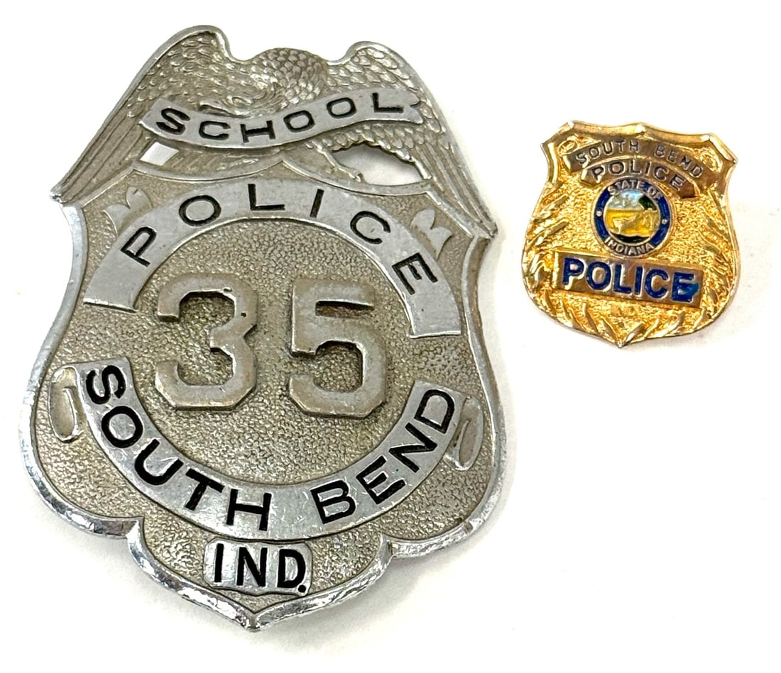 South Bend Police Department School Badge # 35 & Police Pin: South Bend Police Department School Badge # 35 & Police Pin.? The South Bend Police Department School Badge is in nice used condition.? This vintage badge on the back reads D west Fire & Safety Equipt