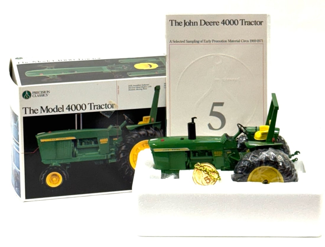 1:16 ERTL Precision Classics John Deere Model 4000 Tractor: 1:16 ERTL Precision Classics John Deere Model 4000 Tractor (Item# 5684) in Original Box.? 1994 Mfg. Date, Tractor and Box are both in good condition.?