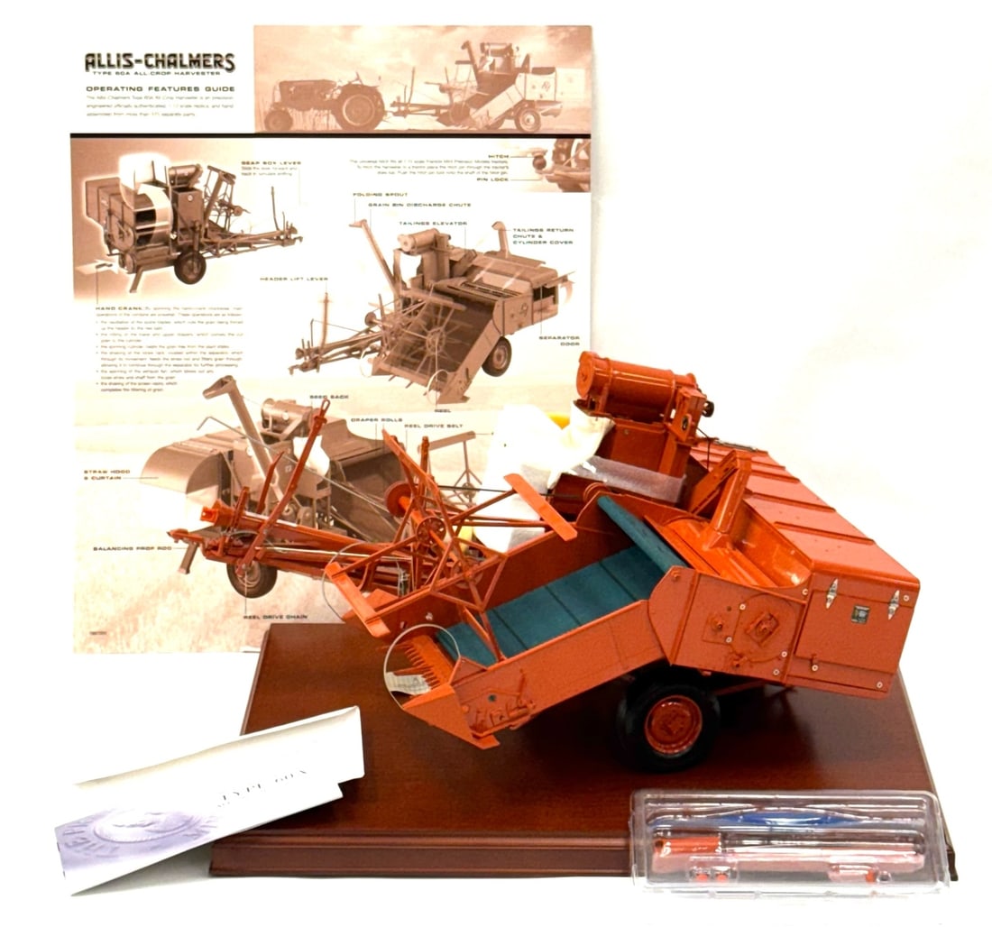 1:12 Franklin Mint Allis-Chalmers Type 60A All-Crop Harvester: 1:12 Franklin Mint Allis-Chalmers Type 60A All-Crop Harvester (Item# B11A114) in Original Box with all Original Inserts.? This Replica is hand assembled from more than 375 parts.? Tractor is in good c