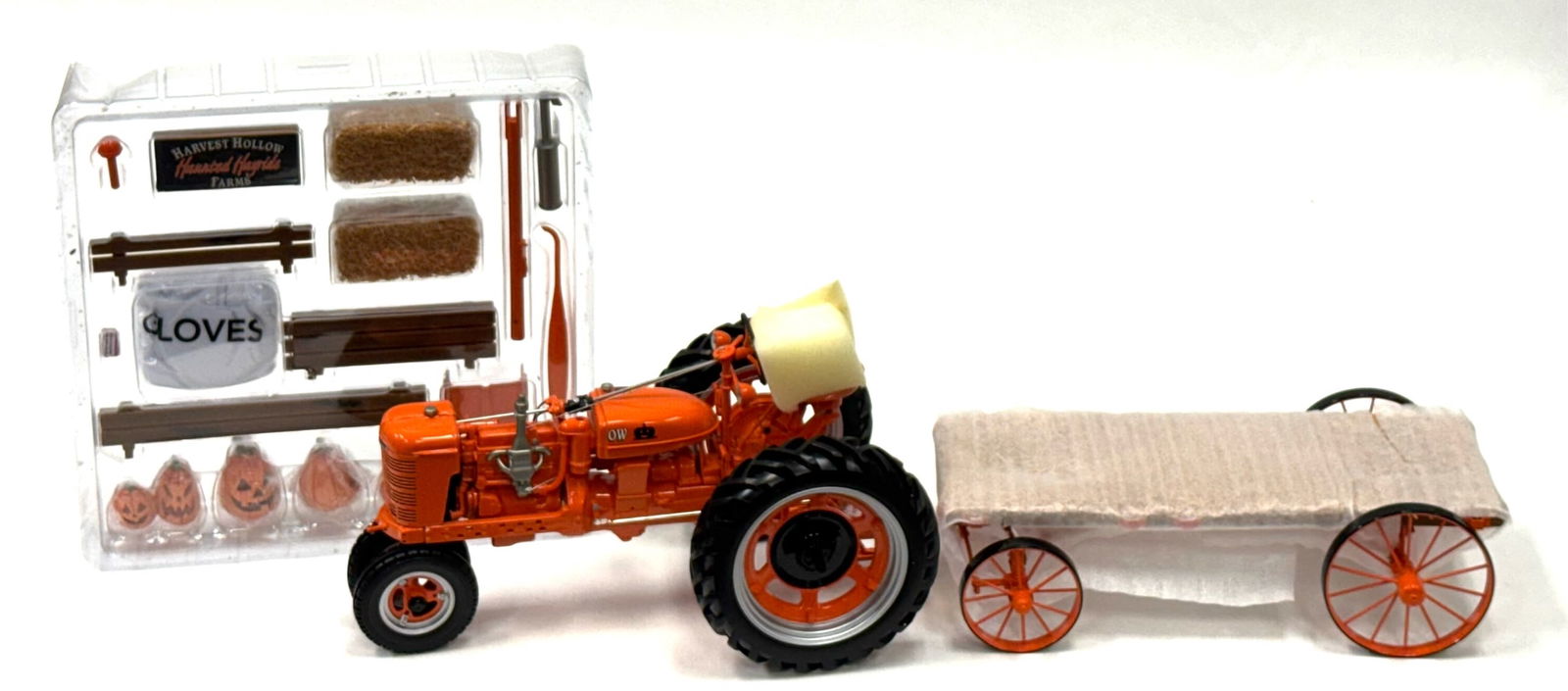 1:12 Franklin Mint Harvest Hollow Farms Farmall H Tractor & Hayride Wagon: 1:12 Franklin Mint Harvest Hollow Farms Farmall H Tractor & Hayride Wagon Replica (Item# B11ZG79) in Original Box with Inserts.? Tractor and Wagon are in good condition with factory packaging intact,