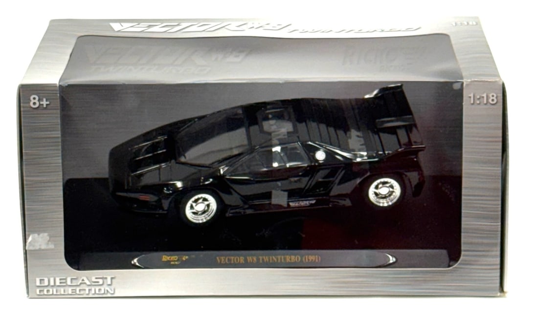 1:18 Ricko 1991 Vector W8 Twinturbo Black Die-Cast Replica: 1:18 Ricko 1991 Vector W8 Twinturbo Black Die-Cast Replica (Item# 32119).? Car is in good condition in packaging, Box does have some normal wear due to age and display.