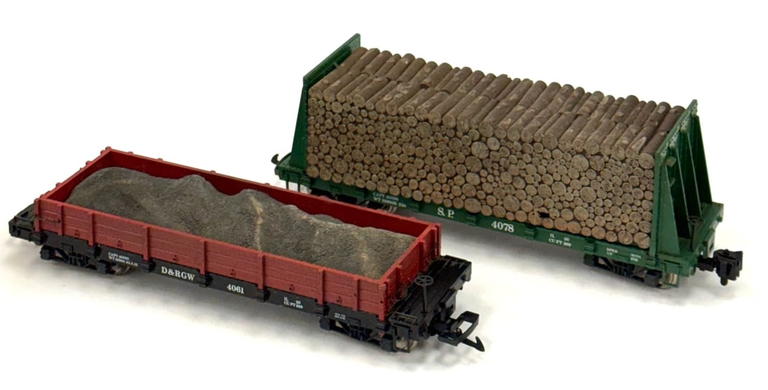 L.G.B. S.P. Bulkhead Flatcar with Logs (4078) & D & RGW Low Side Gondola (4061): L.G.B. S.P. Bulkhead Flatcar with Logs (4078) & D & RGW Low Side Gondola (4061) G-Scale.? These used train cars are in good condition and just need a little cleaning.