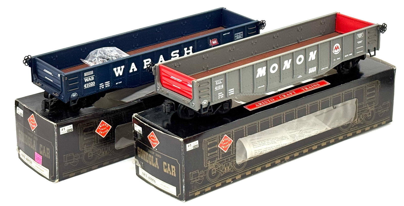 Aristo Craft Trains Drop End Gondola Cars, G-Scale: Aristo Craft Trains Drop End Gondola Cars, G-Scale.? ?Including ART-41020 & ART-41016 both with Boxes.? Train cars are in good condition, boxes have some wear and damage due to age and storage.