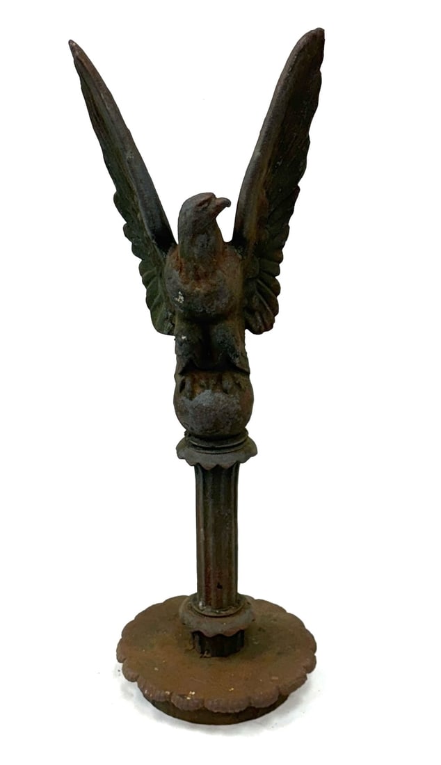 Cast Iron Eagle Fence Post Topper: Cast Iron Eagle Fence Post Topper. This post Topper Depicts An Eagle with Its Wings Spread, Perched Atop A Sphere. This Topper Measures 24" x 8 1/4" x 7 3/4". There Are Areas Of Patina, As Well As Sur