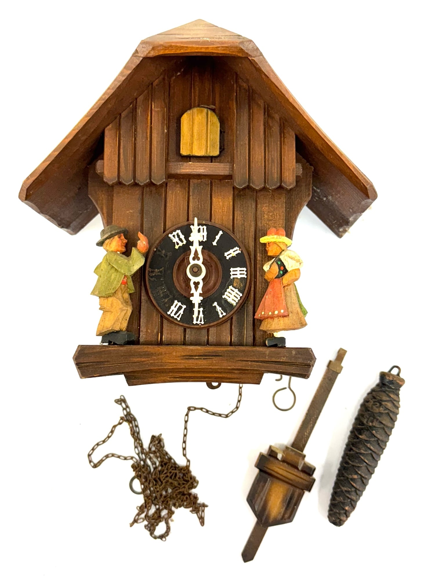 German Kuckucksuhr Cuckoo Clock with Dancers: German Kuckucksuhr Cuckoo Clock with Dancers.? the German Kuckucksuhr Cuckoo clock is in very nice used condition.? Clock measures 9 x 10 inches.? Clock is missing some numbers on the face.? Kuckucksu