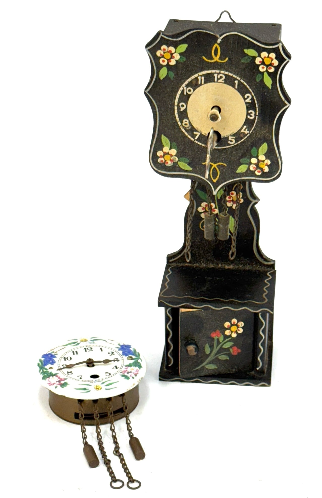 German Miniature Grandfather Clock with Otto Kaster Clock: German Miniature Grandfather Clock with Otto Kaster Wall Clock .? The two German clocks are in very nice used condition.? On the back of the Otto Kaster clock reads Uhren Schmuck Koblenz Lohrstr 123.?