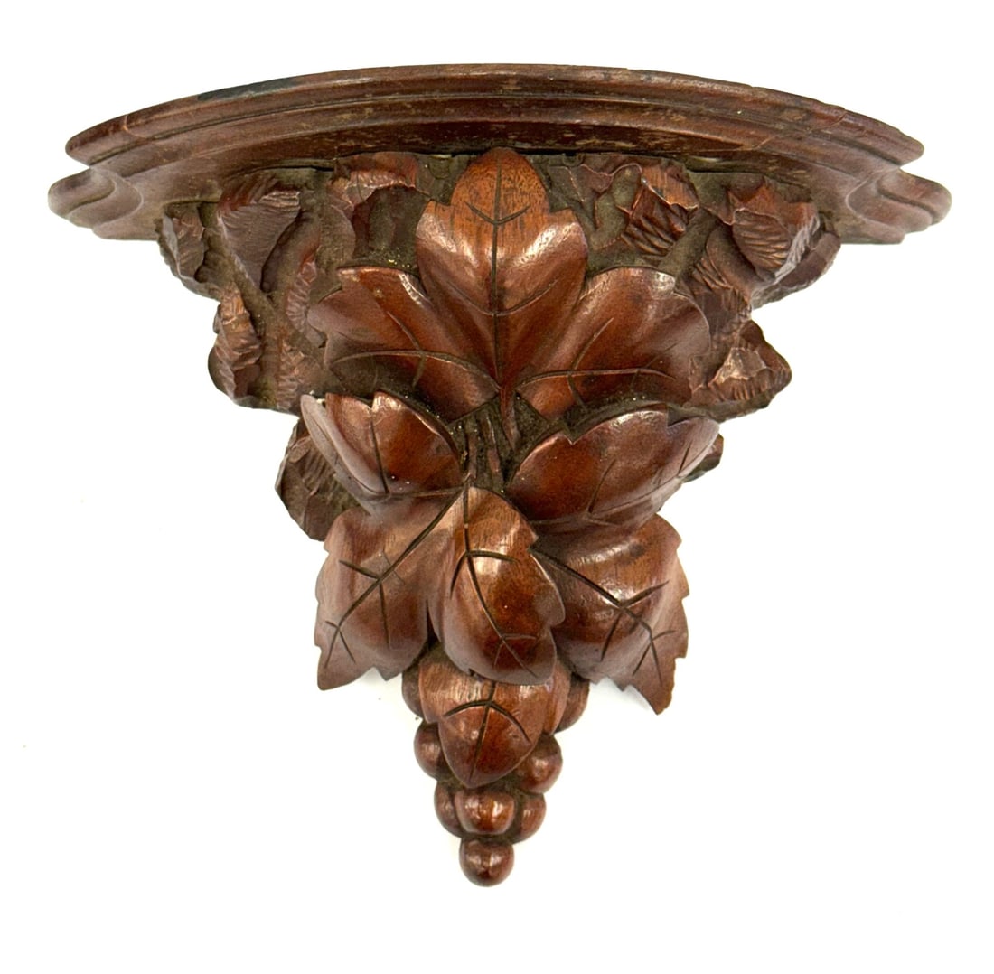 German Black Forest Carved Wall shelf: German Black Forest Carved Wall shelf,? Front part of shelf has been glued, This shelf with beautiful detail Measures 11in x 8in