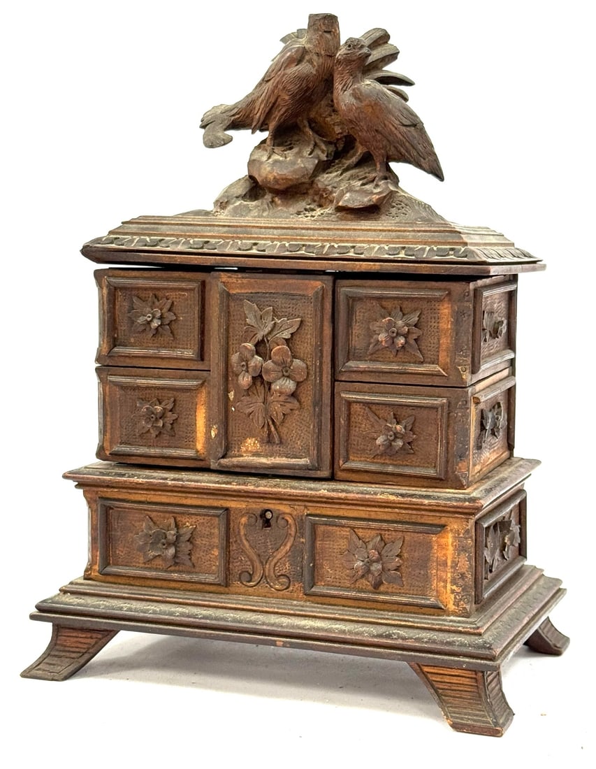 Antique Black Forest Carved Jewelry Dresser: Antique Black Forest Carved Jewelry Dresser.? This beautiful piece has great detail and unique opening display.? Has some normal wear due to use and age but otherwise in good condition. (Is missing he
