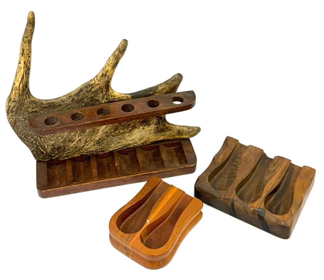 (3) Pipe Holders and Racks: (3) Pipe Holders and Racks. The First Rack Is Designed To Hold 6 Pipes and Has An Animal Antler For The Background. The Second Is A Netop Three Pipe Rest, While The Third Is A Two Pipe Rest. All Are I