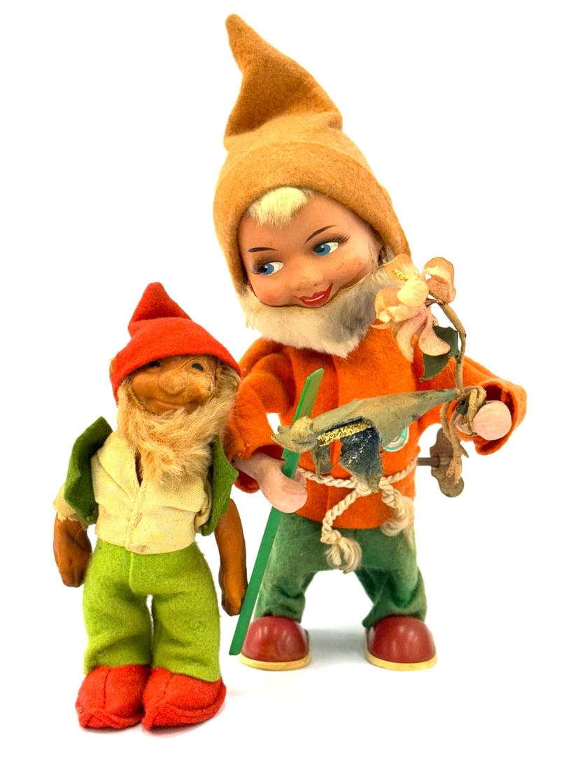 Vtg. Steiff Gnome Lucki and West Germany Wind-Up Gnome: Vtg. Steiff Gnome Lucki and West Germany Wind-Up Gnome.? Steiff doll has original tag (unattached), has a Mohair beard with some wear due to age.? 8.5in wind-up mechanical gnome is dressed in felt and