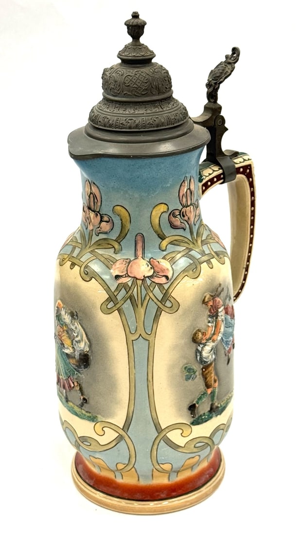 Antique Matthias Grimscheid 4 Liter Stein with Pewter Lid: Antique Matthias Grimscheid 4 Liter Stein with Pewter Lid. This Large Stein Is In Very Good Condition. The Ornate Pewter Lid Is In Good Working Condition. There Are Dancing Couples In High Relief Depi