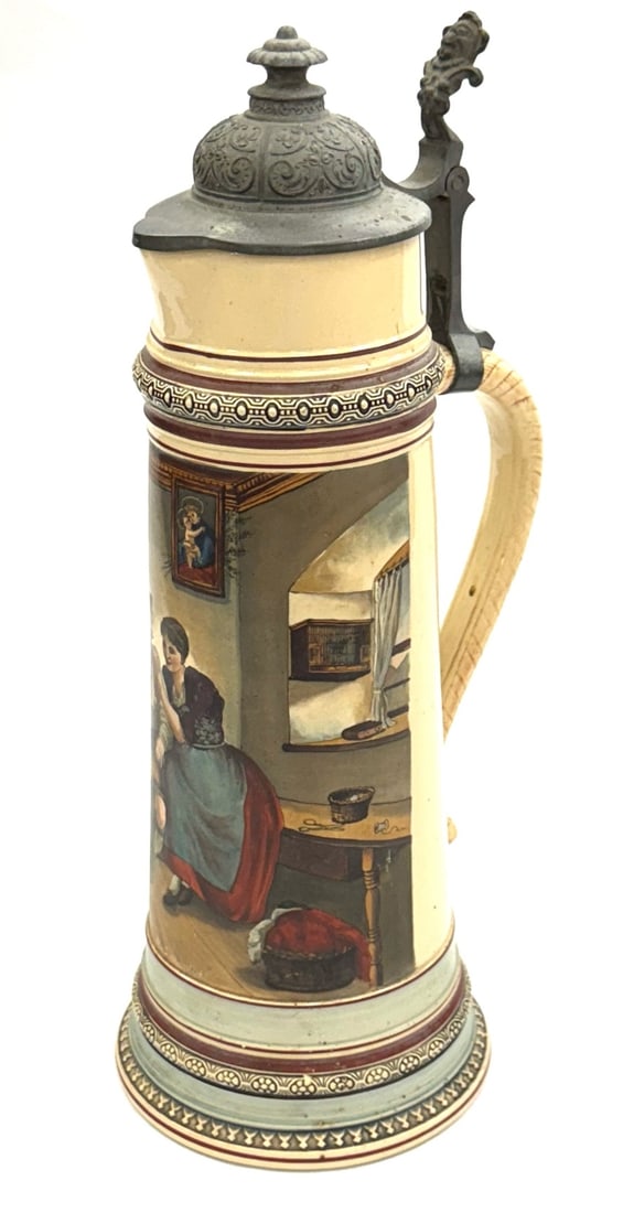 2 1/2L "The Lieblingslied" Stein with Pewter Lid: 2 1/2L "The Lieblingslied" Stein with Pewter Lid. The Maker's Mark On This Large Stein Is Of A Lion with Crowned Shields, Possibly Royal Doulton? The Mold Number, 1190, Is Die Stamped Into The Bottom 