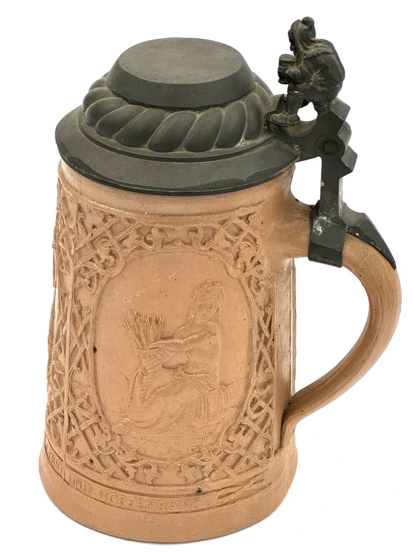 Antique Regensburg Gambrinus Stein: Antique Regensburg Gambrinus Stein. This One Liter Stein Is In Very Good Condition. It Has A Domed Pewter Lid with A Gnome Looking Into A Stein. The Stein Is Decorated In High Relief and Features Latt