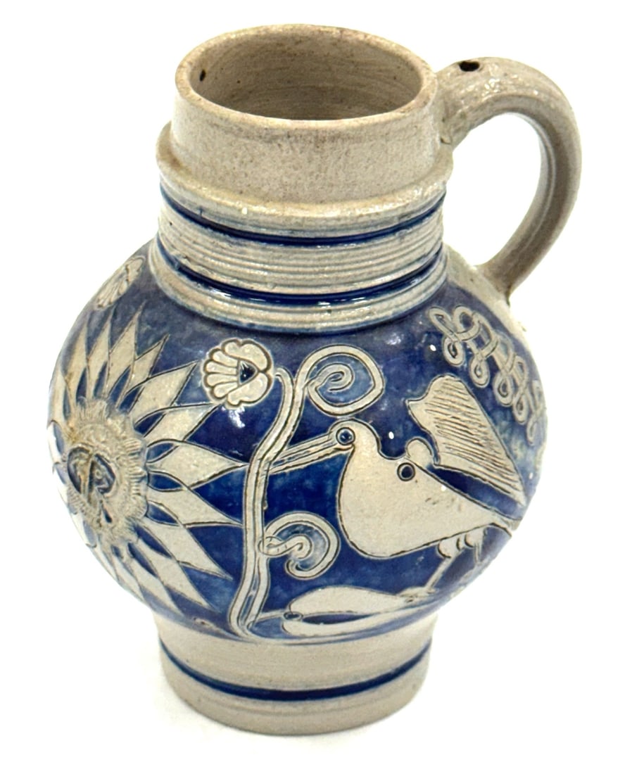 German Westerwald Salt Glazed "GR" Stoneware Jug: German Westerwald Salt Glazed "GR" Stoneware Jug. This Is Believed To Be Circa 1710. It Has A Reeded Cylindrical Neck, Is Decorated with Birds, Snakes and The GR (Georgius Rex?) with Incised Rays Of S