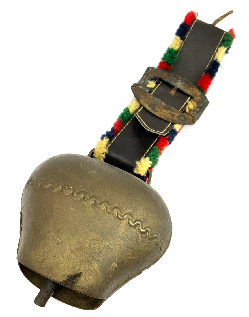 Antique Brass Swiss Cowbell: Antique Brass Swiss Cowbell. This Cowbell Measures 6-1/4 Inches Wide x 6-1/4 Inches Tall. It Has The Original Leather Strap That Measures 8-1/2 Inches With A Decorative Buckle And Colorful Fringe Of B