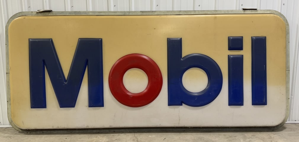 10ft Mobil Gas Station Embossed Sign: 10ft single sided embossed plastic Mobil Gas Station advertising sign pannel. Has discoloration, scratches, and other wear from use and age. It measures approximately 10ft across by 52in.
