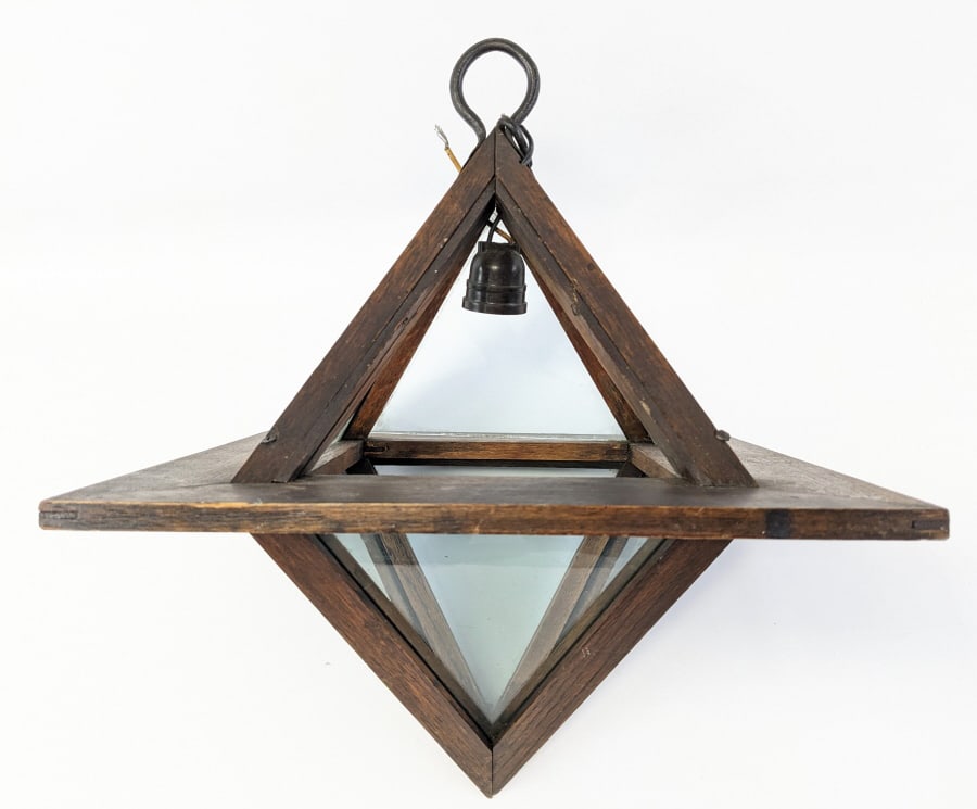 Antique Oak & Glass Arts & Crafts Hanging Lamp: Very nice antique oak and glass Arts & Crafts hanging lamp. The center of the lamp is square with a pyramid shape on the top and bottom, has 8 panes of clear glass, one is missing, and an iron hook. T