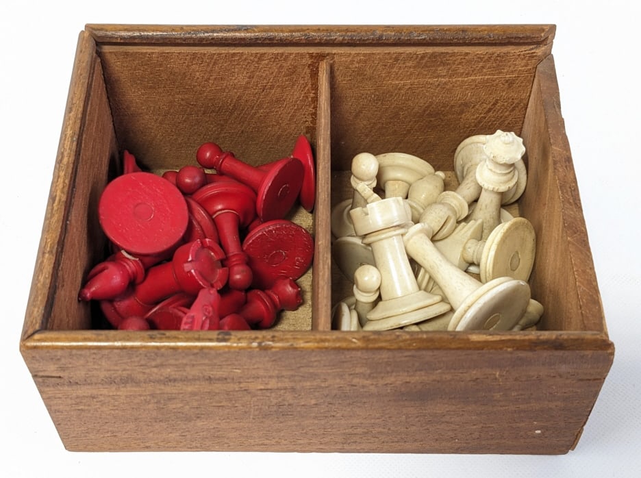 Civil War Soldier Chess Pieces In Wood Box: Civil War Soldier Chess Pieces in a wood box. The bone pieces are in good condition, only 30 pieces, 15 white and 15 painted red. Box measures 2-3/8" tall x 5-1/2" across x 4-1/4" deep.