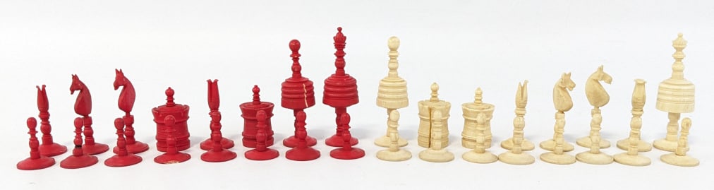 Antique 32 Piece Bone Chessmen: Antique 32 piece Bone Chessman. The bone pieces are in good condition with some chips, complete set of 32 pieces.Sizes range from 1" to 2-3/4" tall.