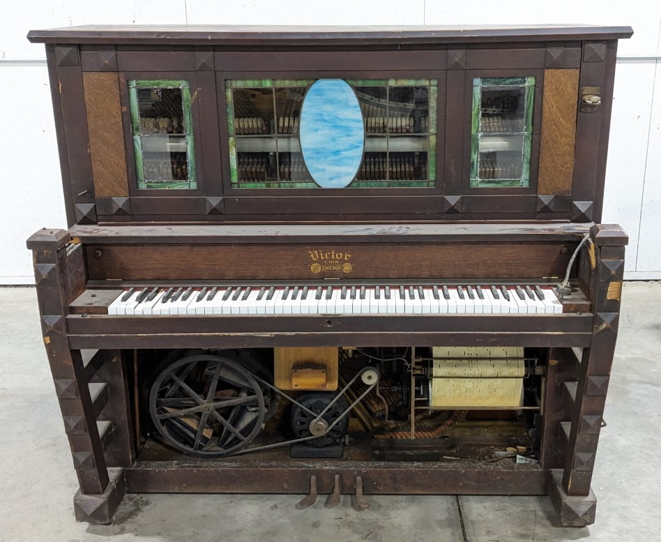 Vintage Victor Coin Coin-Operated Player Piano: Vintage Victor Coin coin-operated player piano. It is in fair non-working condition. It is ready to be restored and appears to be complete except for the lower front panel and a small side wood piece.