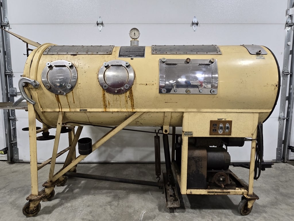 Vintage J.H. Emerson Respirator Iron Lung: Vintage J.H. Emerson Respirator Iron Lung. It is untested and and needs some cleaning from being in storage. Serial Number UCF156. Measures approximately 94" across x 60" tall x 30" deep. Comes on cas