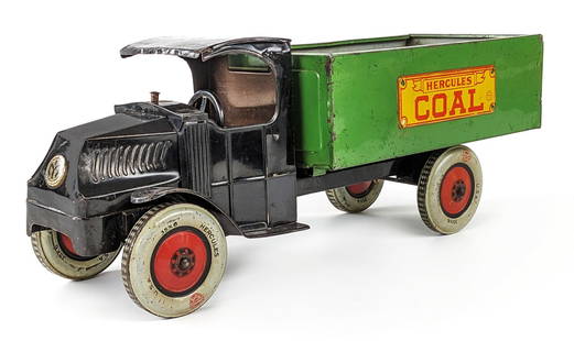 Original J. Chein Hercules Mack Coal Truck: Original J. Chein Hercules Mack Coal Truck. The steering wheel may have been replaced, but looks correct. The truck has some minor paint loss, oxidation in the bed, and minor dents on the thin metal "