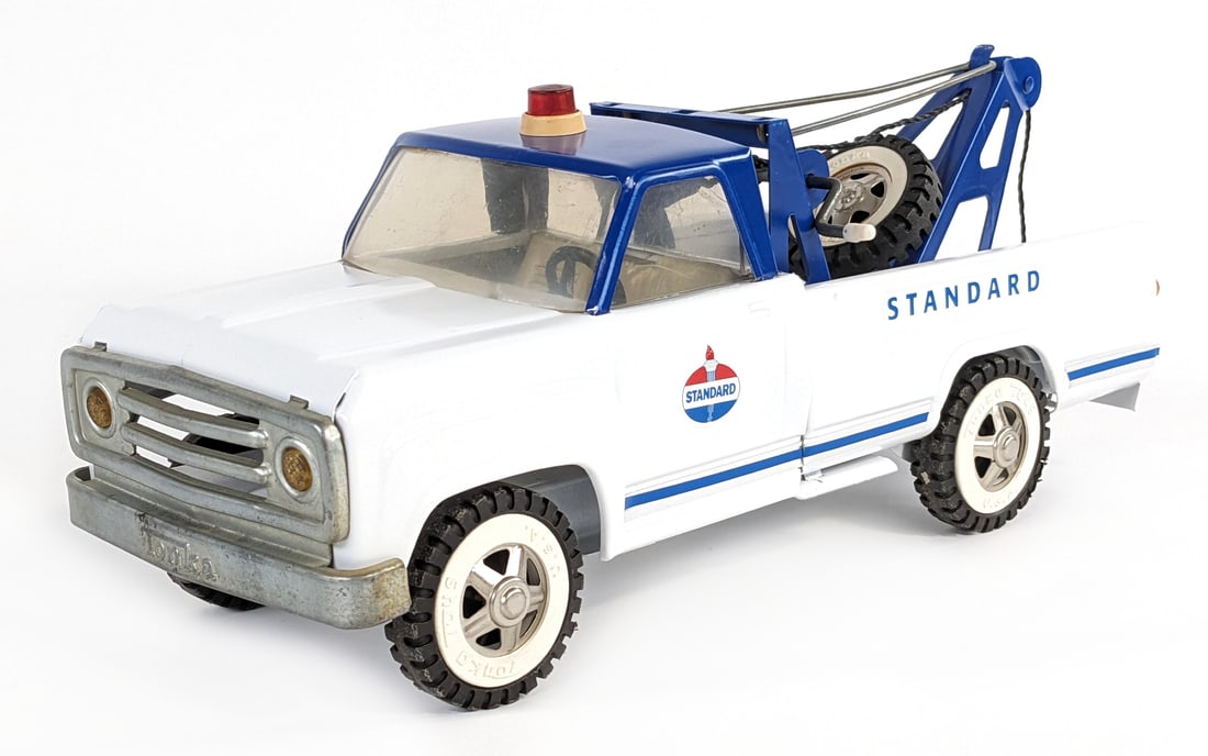 Custom Tonka Dodge Standard Oil Wrecker Tow Truck: Custom Tonka Dodge Standard Oil wrecker tow truck. Displays well with Standard decals and a custom paint job. Good condition. Measures approximately 15" long.