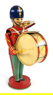 J. Chein Tin Windup Bass Drummer: J. Chein tin windup Bass Drummer. The windup mechanism works. The drummer is excellent overall with minor scratches. Displays very well with great color. Measures approximately 8-1/2" tall.