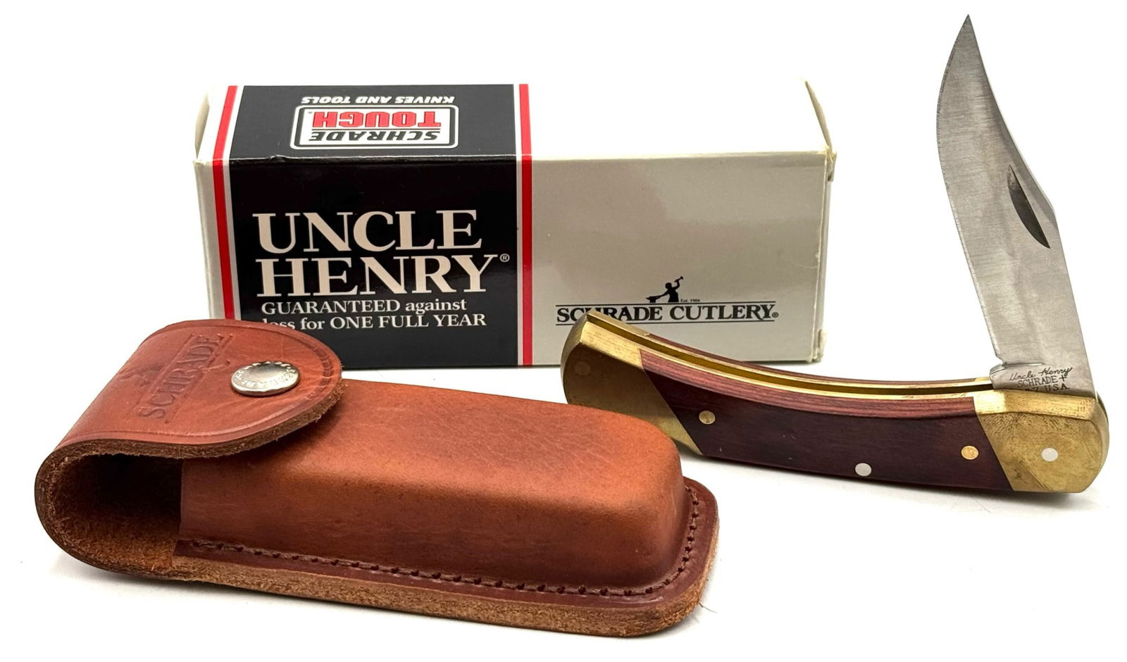Schrade USA Uncle Henry LB7 Bear Paw Lock Back Pocket Knife NIB: Schrade USA Uncle Henry LB7 Bear Paw Lock Back Pocket Knife NIB. Knife measure 8 3/4 inches in length, box contains paperwork, and sheath. Crafted for the avid collector and outdoor enthusiast, the Vi