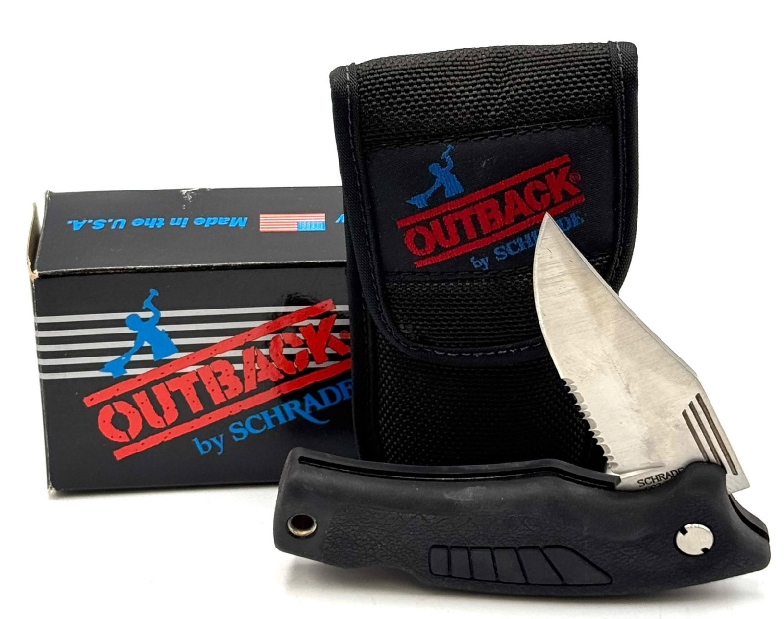 Schrade USA SG7S Outback Serrated Folding Knife NOS: Schrade USA SG7S Outback Serrated Folding Knife NOS. ?Great vintage unused condition, blade measures 4 inches in length.? Original box contains paperwork and black nylon sheath.? A great knife